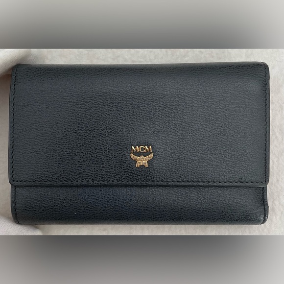 MCM Handbags - MCM Authentic Blue-Grey Leather Wallet with Pink Interior and Gold Emblem